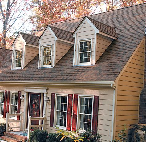 pictures of houses with brown metal roofs|reddish brown roof house colors.